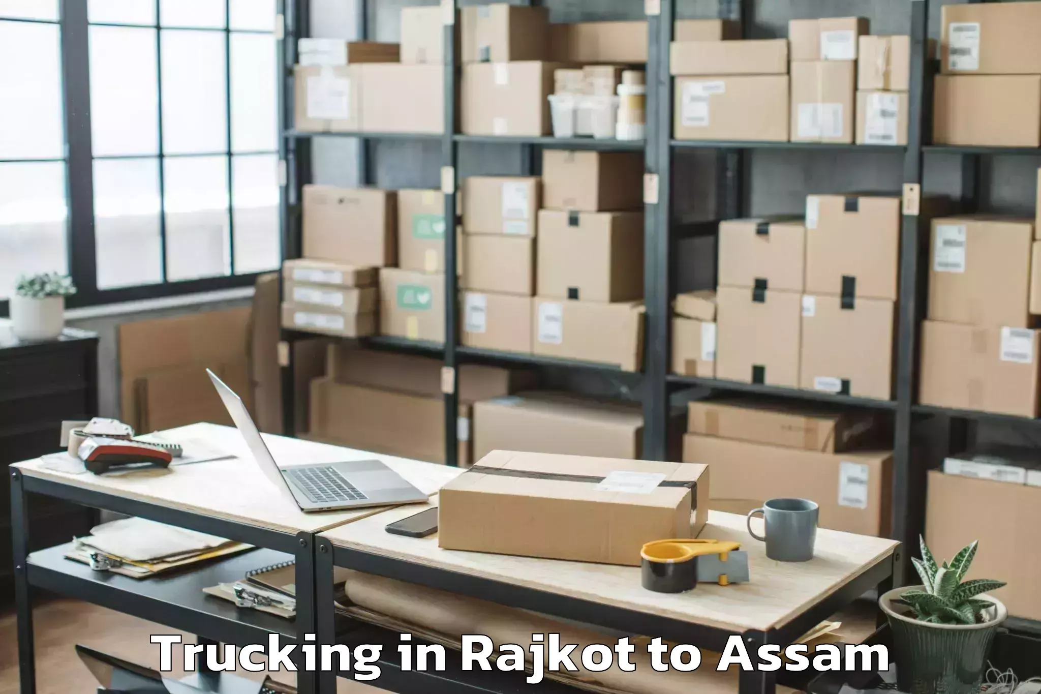 Top Rajkot to Abhilashi University Jorhat Trucking Available